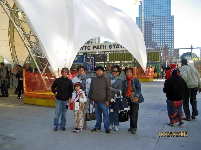 At the Ground Zero site -NYC.  Behind us is a white tent shade..jpg