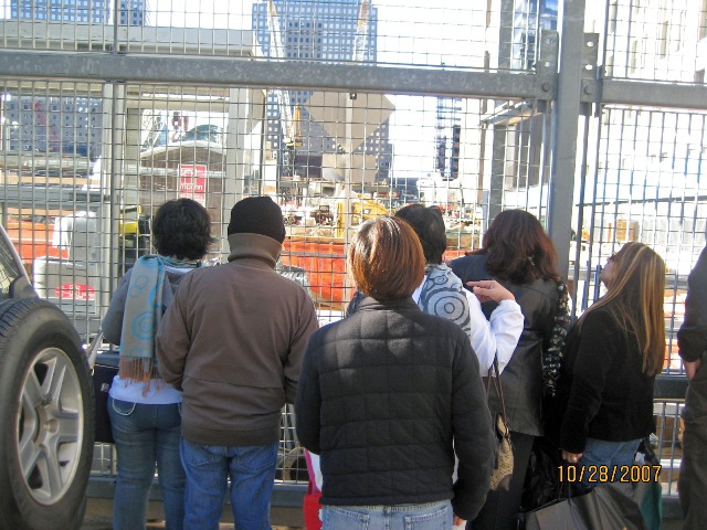 Backview while looking at the dephts of the  very strong foundation of Ground Zero -NYC.  Make a right guess..jpg